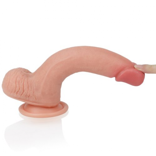 Фаллоимитатор на присоске с мошонкой Dual layered Liquid Silicone Nature Cock 21 см